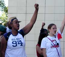 Samantha and friend raising fists